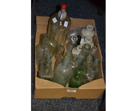 A vintage  soda syphon;  bottles;  etc