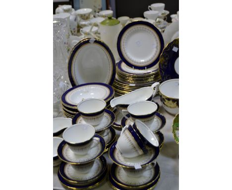 A Royal Worcester Regency pattern dinner and tea  service comprising of  dinner plates, side plates, tureens; etc