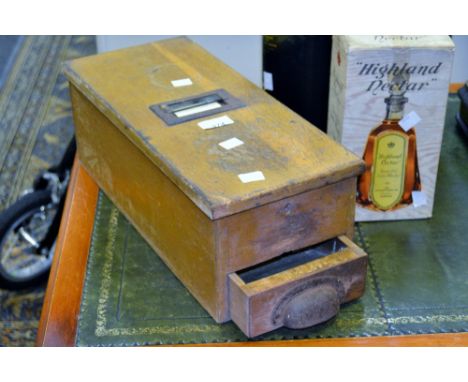 A vintage pine cash register, with bell