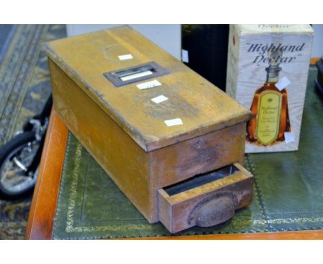 A vintage pine cash register, with bell