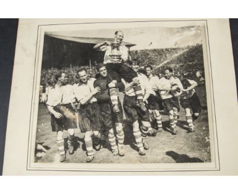 Football, a b/w photograph of the Charlton Athletic team winning the cup in 1947 18" X 16"