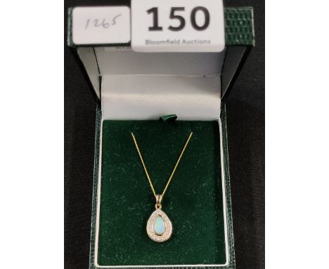 9CT GOLD DIAMOND SET OPAL PENDANT ON 9CT GOLD CHAIN