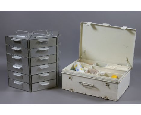 A St Johns ambulance first aid tin with contents and an alluminium collectors chest.
