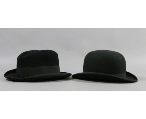 A gentlemens bowler hat and trilby.