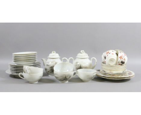 A Japanese egg shell part tea service along with an Edwardian part tea service decorated in the Cairo pattern, approximately 