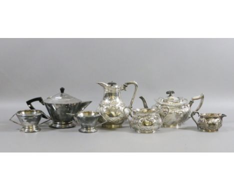 An Art Deco three part silver plated tea service along with one other tea service.