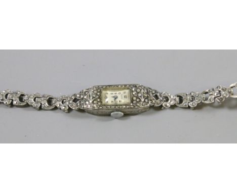 A ladies Rotary cocktail wristwatch with silver strap and marcasite decoration.