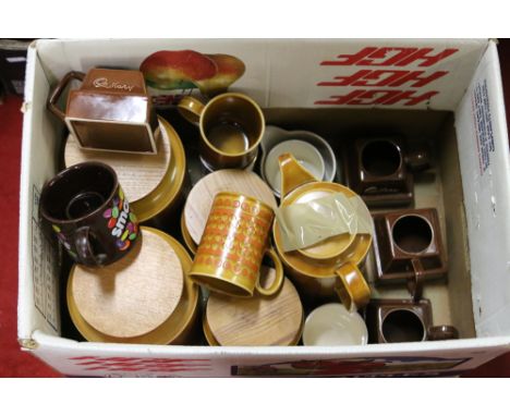 A box of Hornsea pottery to include storage jars and coffee wares in the Saffron design along with four Carltonware chocolate