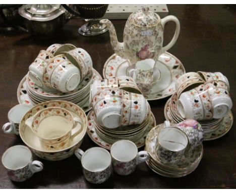 An Edwardian Royal Stafford tea service along with a part teaset printed with crinoline lady.