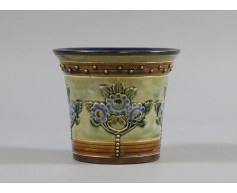 A Royal Doulton stoneware planter of small form with applied floral decoration.