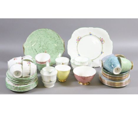 A Royal Albert Gossamer part tea service with a Crown Staffordshire part tea service, approximately forty five pieces in all.