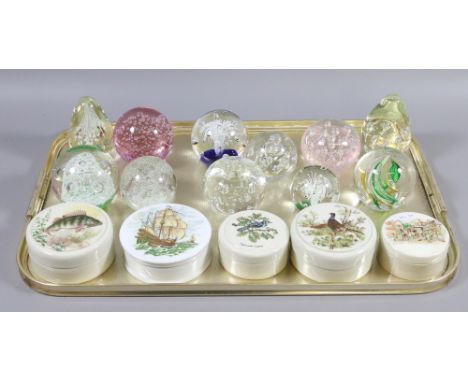 Eleven art glass paperweights and five lidded preserve pots.