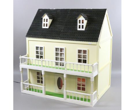 A painted dolls house with internal low volt lighting and a small collection of fittings.