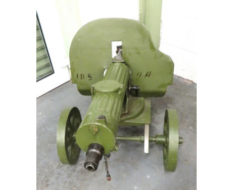 Deactivated Maxim M1910 Russian Heavy MG And Carriage 7.62 mm, 29 inch barrel. &nbsp;Green painted, fluted barrel shroud with