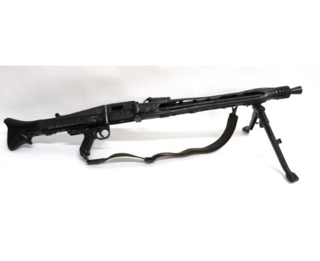 Deactivated M53 Yugoslavian Light Machine Gun 7.62 mm, 24 inch, hidden barrel. &nbsp;Front flash hider. &nbsp;Pierced, square