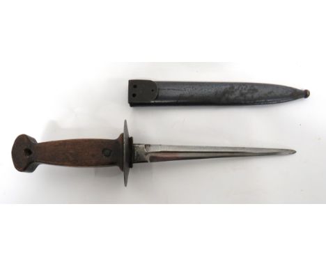 WW1 Belgian Combat Trench Knife 7 3/4 inch, double edged blade with offset fuller. &nbsp;Steel, oval disc crossguard. &nbsp;P