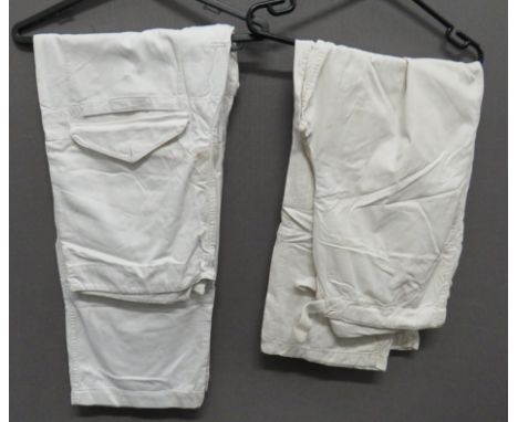 Two Pairs of British WW2 Camouflaged Snow Suit Over Trousers&nbsp; white cotton over trousers. &nbsp;Left leg with large patc