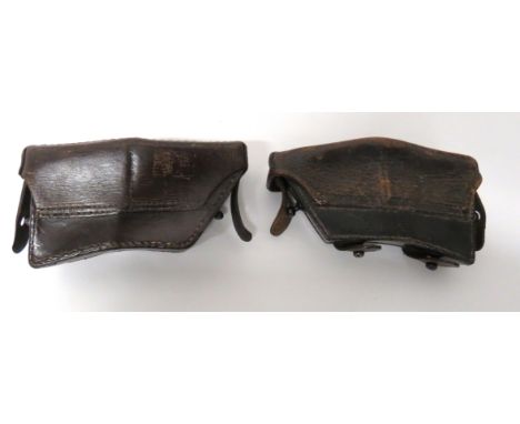 Facing Pair Of WW1 Austrian Issue M1888 Ammunition Pouches brown leather, rectangular pouches. &nbsp;Top flap secured at the 