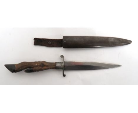 WW1/WW2 German Trench Knife 5 1/4 inch, single edged blade. &nbsp;Steel, S shape crossguard. &nbsp;Steel ferrule. &nbsp;Deer 