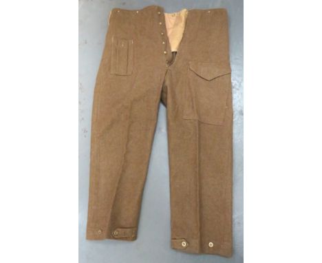 Pair Of 1937 Pattern Battle Dress Trousers khaki woollen, wide leg trousers. &nbsp;Right hip with pleated first aid pockets. 