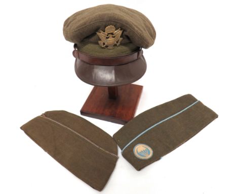 Three WW2 American Caps consisting service dress cap with woollen khaki crown and body. &nbsp;Green mohair band. &nbsp;Brown 