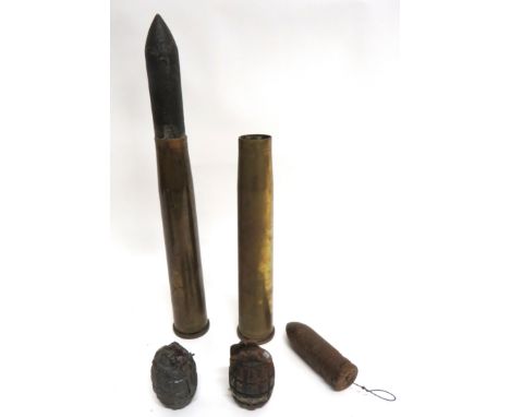 Two WW2 40mm Shells brass cases, one dated 3/39, the other 1944. &nbsp;Both complete with steel heads (one loose). &nbsp;Toge