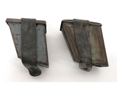 Two WW1 Austrian Issue Pressed Steel Ammunition Pouches pressed sheet steel pouches with hinged lid. Leather securing strap. 