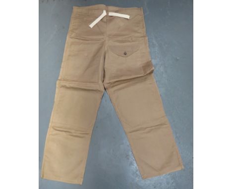 WW2 Dated Khaki Tan Windproof Over Trousers&nbsp; light khaki cotton, wide leg, windproof over trousers. &nbsp;Front left leg