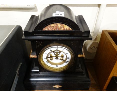 A Victorian Black Marble Mantel Clock With Circular Dial