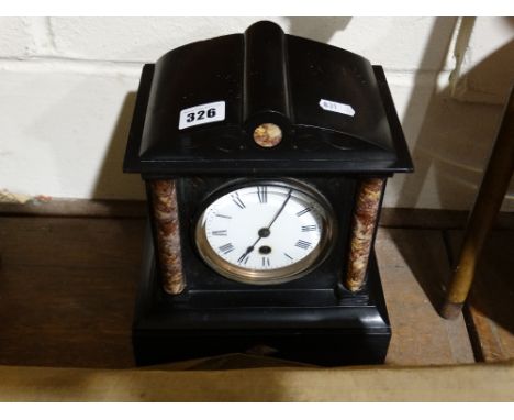 A Victorian Black Marble Mantel Clock With Circular White Enamel Dial