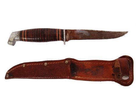 A 20th century striped wooden handled hunting / military knife. Possibly by Ragnar of Finland. Marks obscured. Knife housed i