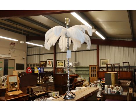 A Boa feather decorated decorative table lamp