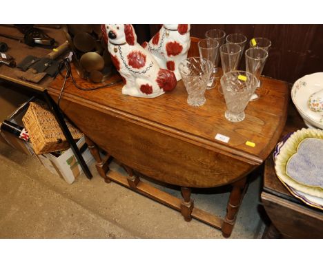 An oak gate leg dining table 