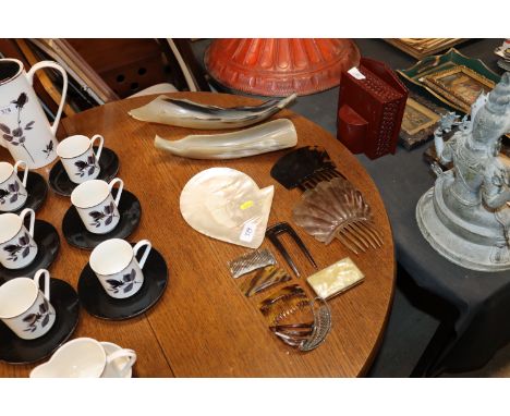 A large mother of pearl shell; various combs etc. 
