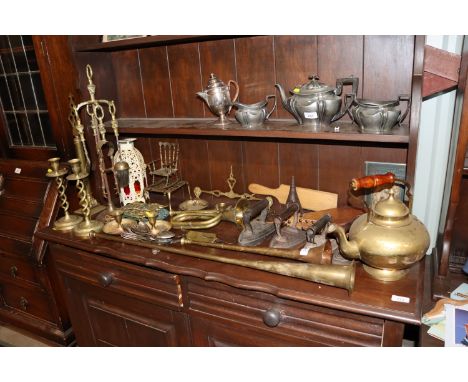 A large quantity of brass and copperware including companion stand, kettle, candlesticks, bugle, post horns etc.