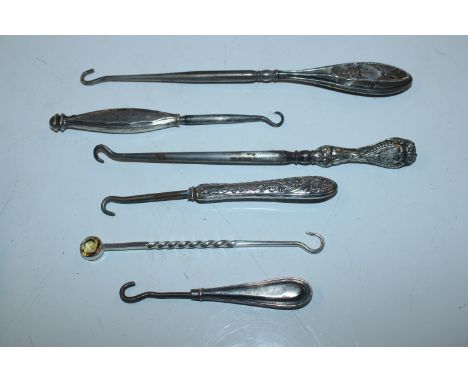 A white metal and citrine set button hook and five other silver handle button hooks - some AF