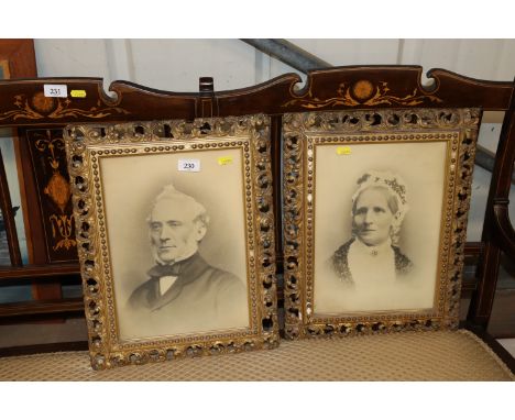 A pair of early 20th Century portrait photographs contained in gilt frames 