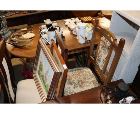 A set of four oak framed dining chairs with tapestry style upholstered seats and backs and two other chairs 