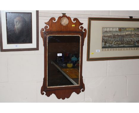 A mahogany Chippendale design fret carved wall mirror 