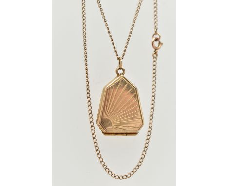 A 9CT GOLD LOCKET WITH CHAIN, unusual shape locket detailed with a sunrise pattern, hinged cover, hallmarked 9ct Birmingham, 