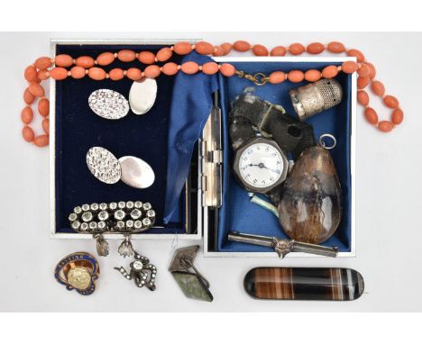 A SELECTION OF ITEMS, to include an oval coral bead necklace, fitted with a base metal spring clasp, length 440mm, each coral