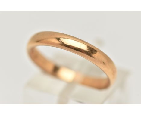 A YELLOW METAL BAND RING, polished band, unmarked, ring size N 1/2, approximate gross weight 4.8 grams (condition report: sig