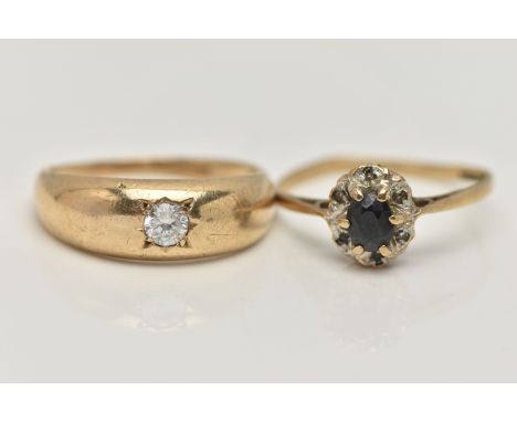 TWO 9CT GOLD RINGS, the first a single circular cut cubic zirconia, star set in a yellow gold domed band, 9ct hallmark rubbed