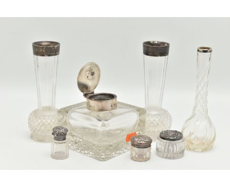 A SMALL ASSORTMENT OF SILVER TOPPED GLASS JARS, to include a silver lidded inkwell, hallmarked 'William Hutton &amp; Sons Ltd