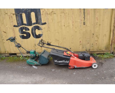 TWO PETROL LAWN MOWERS  FOR SPARES OR REPAIRS comprising a Mountfield with grass box (engine pulls freely but fill bulb decay