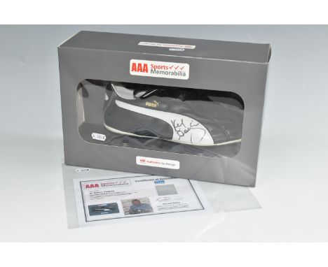 A SIR KENNY DALGLISH SIGNED FOOTBALL BOOT, with certificate of authenticity from AAA Sports Memorabilia Limited, boxed (1 + c