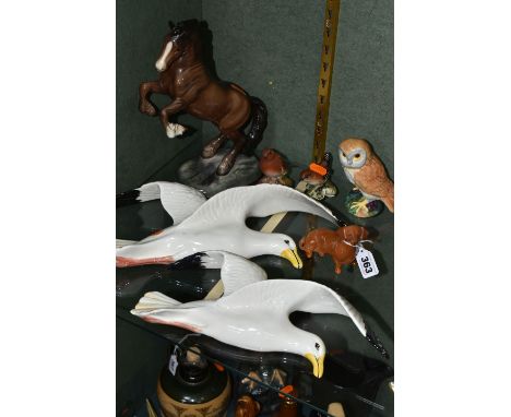 A GROUP OF BESWICK ANIMAL AND BIRD FIGURES, comprising two Seagull wall plaques, style one with wings up and apart, model no'