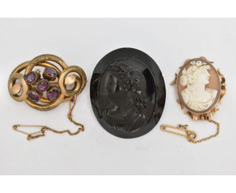 THREE BROOCHES, the first an AF shell cameo brooch collet set in yellow metal with scrolling detail, stamped 9ct, approximate
