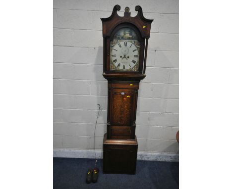 A GEORGIAN OAK EIGHT DAY LONGCASE CLOCK, with swan neck pediment above an arched glazed door, that's enclosing a 12.5 inch pa