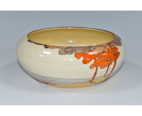 A CLARICE CLIFF CORAL FIRS PATTERN BOWL, painted with a stylised coastal landscape on a cream ground, backstamp reading 'Clar